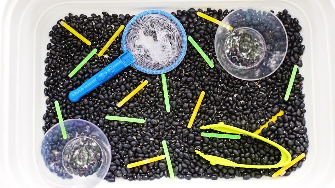 Relive Summer Nights With This Magical Firefly Catching Sensory Bin