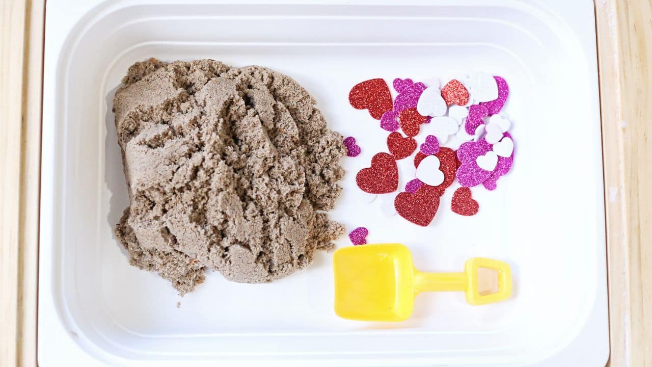 Digging for hearts sensory bin supplies.